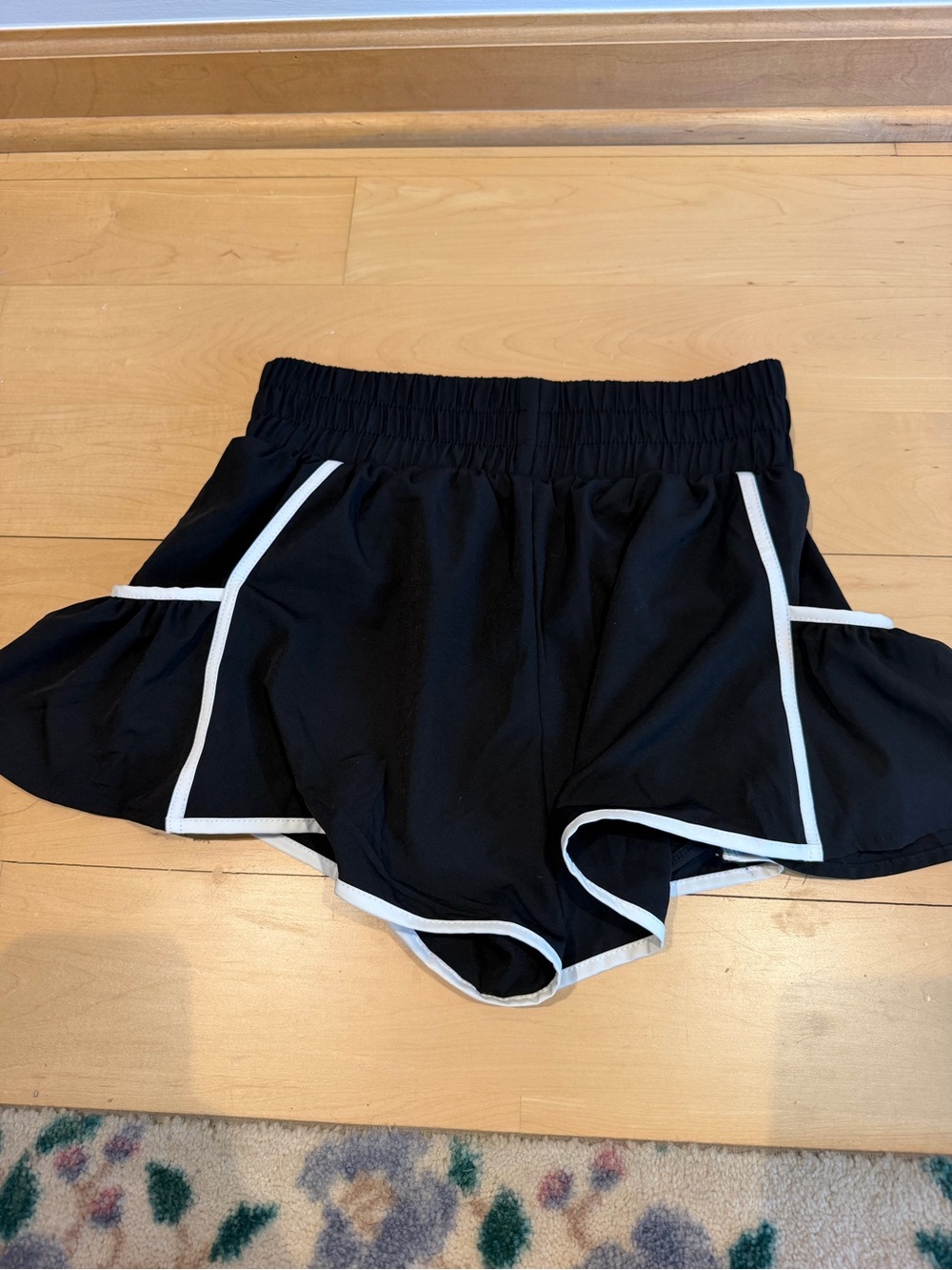 Black Women's Athletic Ruffle Hem Shorts with White Trim